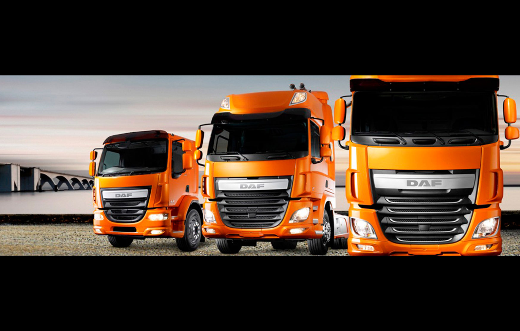 Fleet van lorry insurance, three bright orange DAF lorries